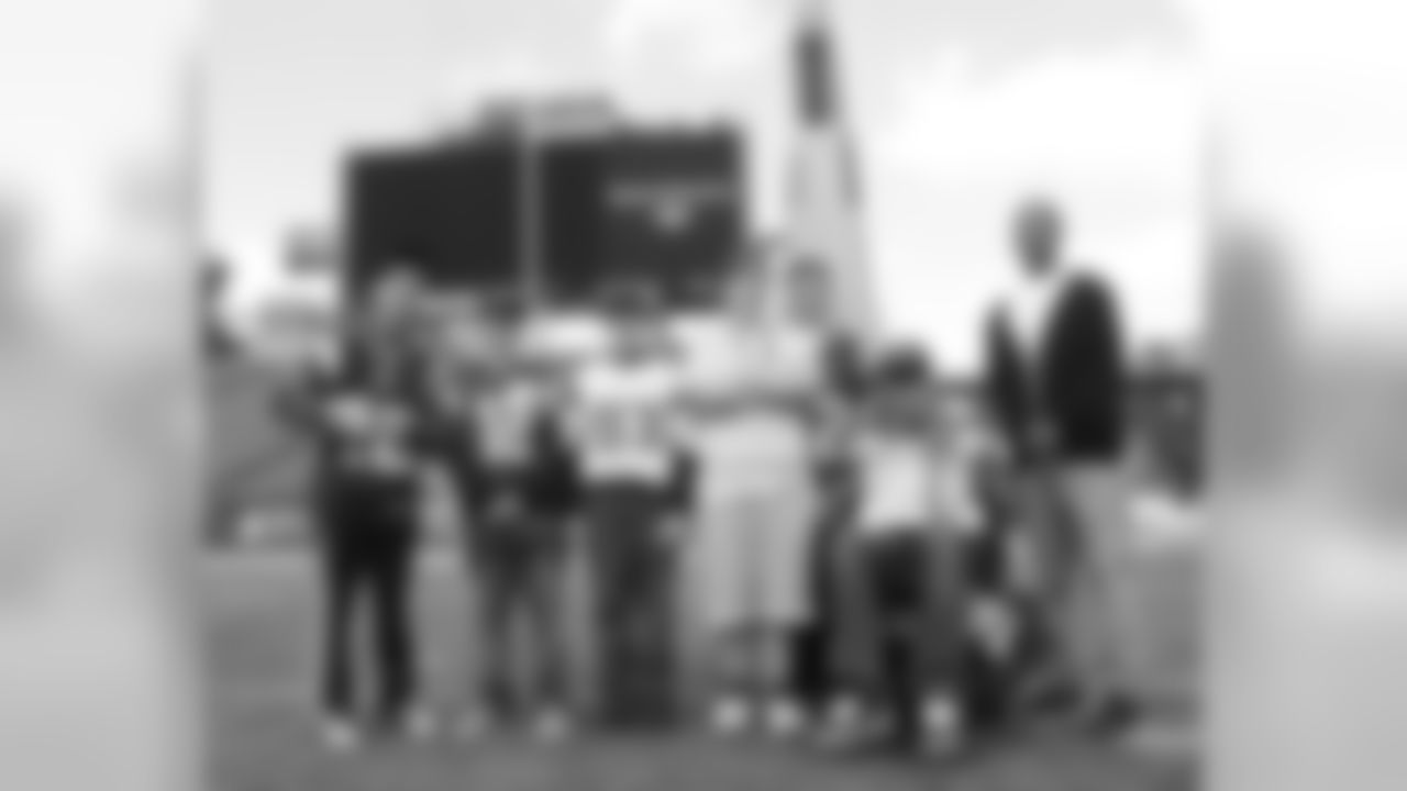 Tom and Wes hung out with seven kids and their families following the team's walkthrough, and Robert Kraft, Bill Belichick and the entire team stopped over to say hello and sign autographs on Saturday, October 15, 2011.