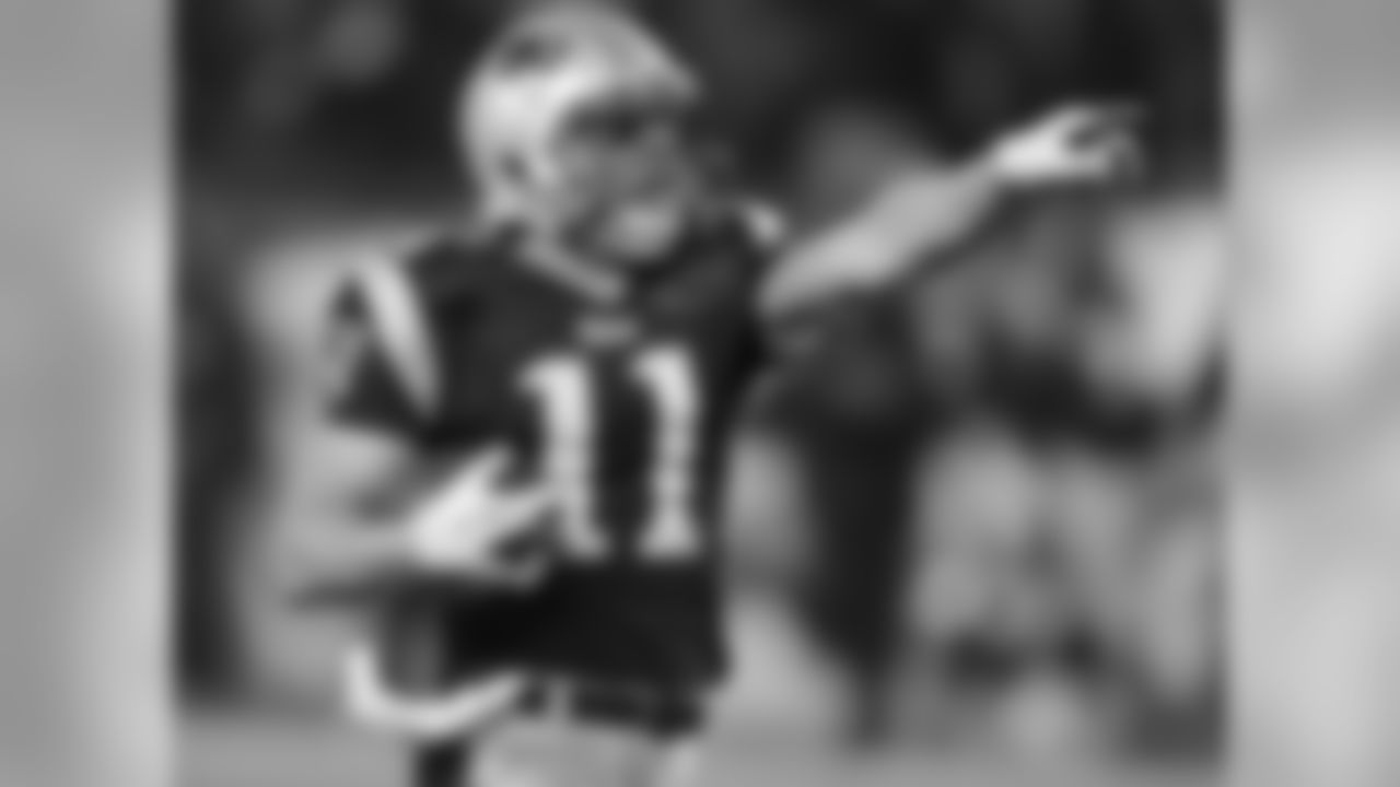 New England Patriots wide receiver Julian Edelman celebrates his 72-yard punt return for a touchdown during the third quarter of an NFL football game against the Kansas City Chiefs in Foxborough, Mass., Monday Nov. 21, 2011. (AP Photo/Stephan Savoia)