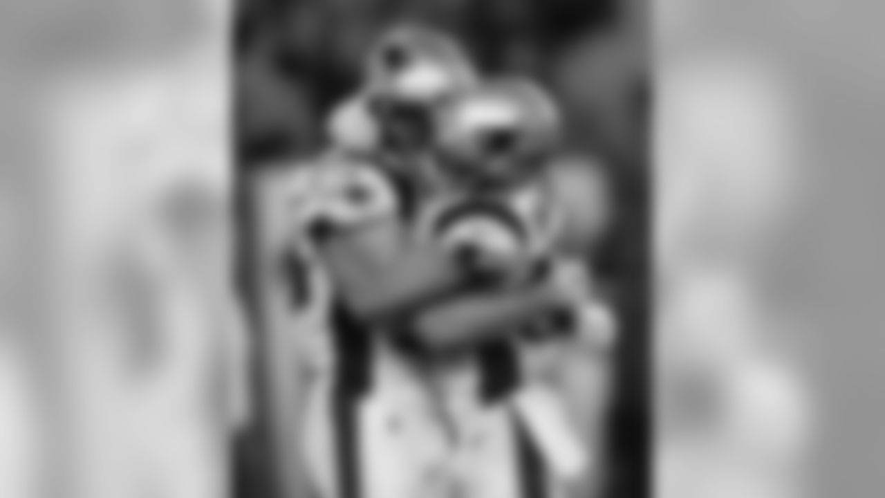 New England Patriots wide receiver Chris Hogan, left, celebrates his touchdown against the Tampa Bay Buccaneers with teammate wide receiver Danny Amendola during the first half of an NFL football game, Thursday, Oct. 5, 2017, in Tampa, Fla. (AP Photo/Jason Behnken)