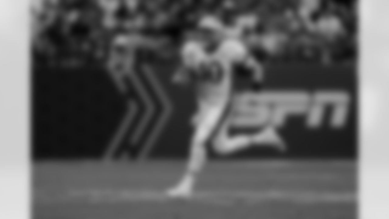AFC quarterback Mac Jones of the New England Patriots (10) runs the ball up the field during the Pro Bowl NFL football game against the NFC, Sunday, Feb. 6, 2022, in Las Vegas. (AP Photo/Steve Luciano)