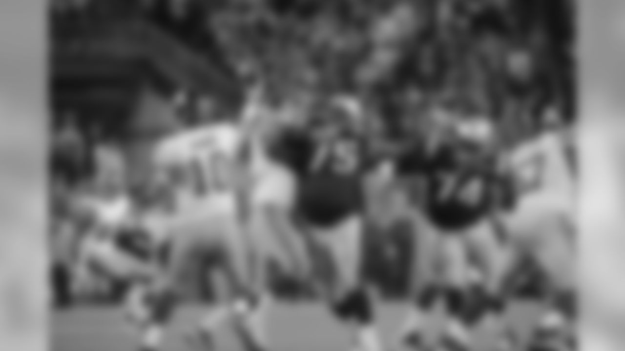 Patriots DT Vince Wilfork powers his way through the Giants offensive line