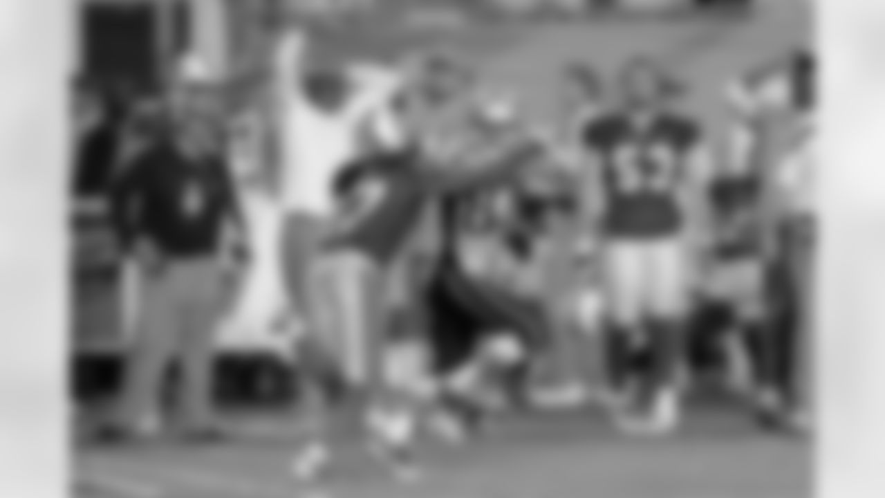 Tom Brady threw for 517 yards and four touchdowns, including a Patriots-record 99-yard strike to Wes Welker, in New England's 38-24 season-opening triumph over Miami on Sept. 12, 2011.
