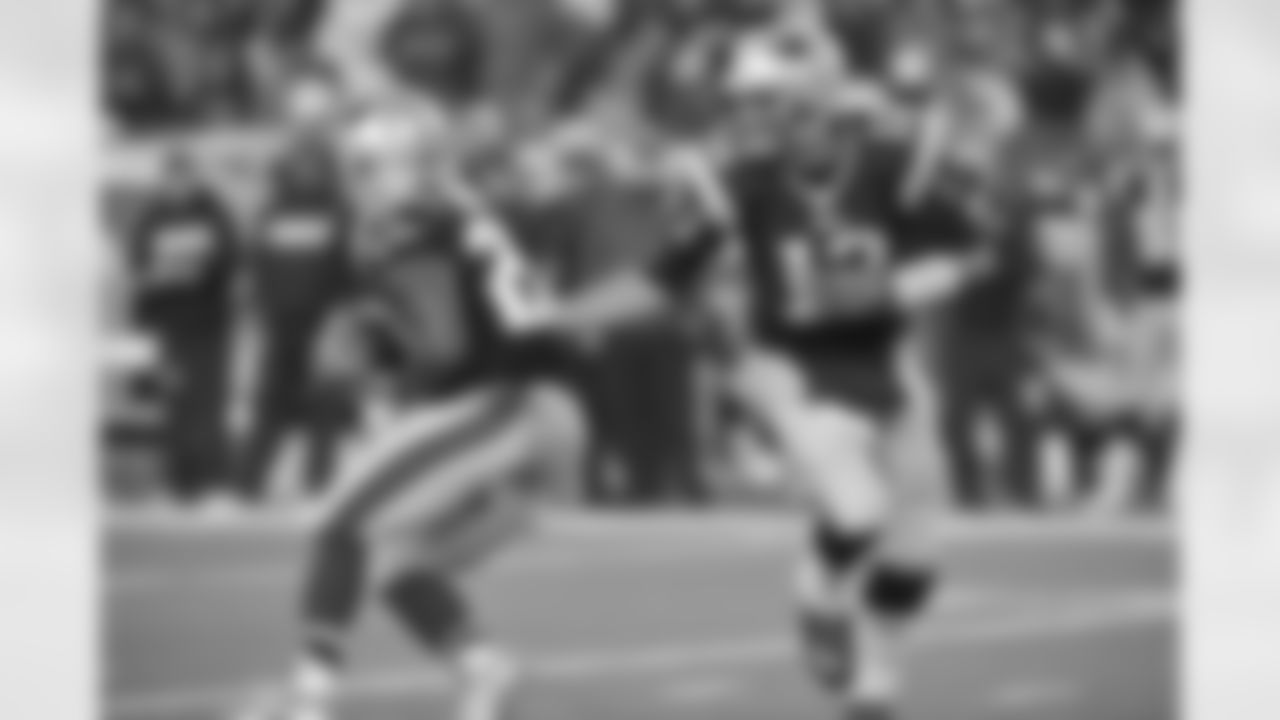 An 84-yard punt return for a touchdown by Julian Edelman highlighted a high-scoring night for the Patriots, who defeated the Broncos 43-21 on Nov. 2, 2014.
