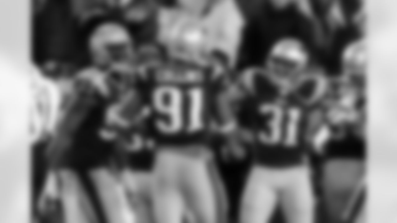 Jamie Collins celebrates his interception