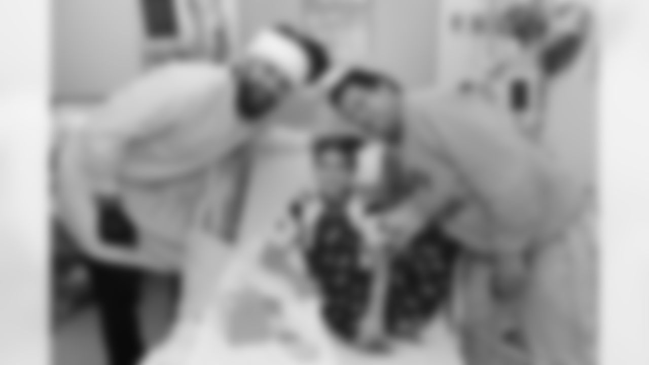BOSTON, MA - DECEMBER 12: New England Patriot alumni Sebastian Vollmer visits with Mike and Dad at Boston Children's Hospital December 12, 2017 in Boston, Massachusetts. (Photo by Darren McCollester/Getty Images for Boston Children's Hospital)