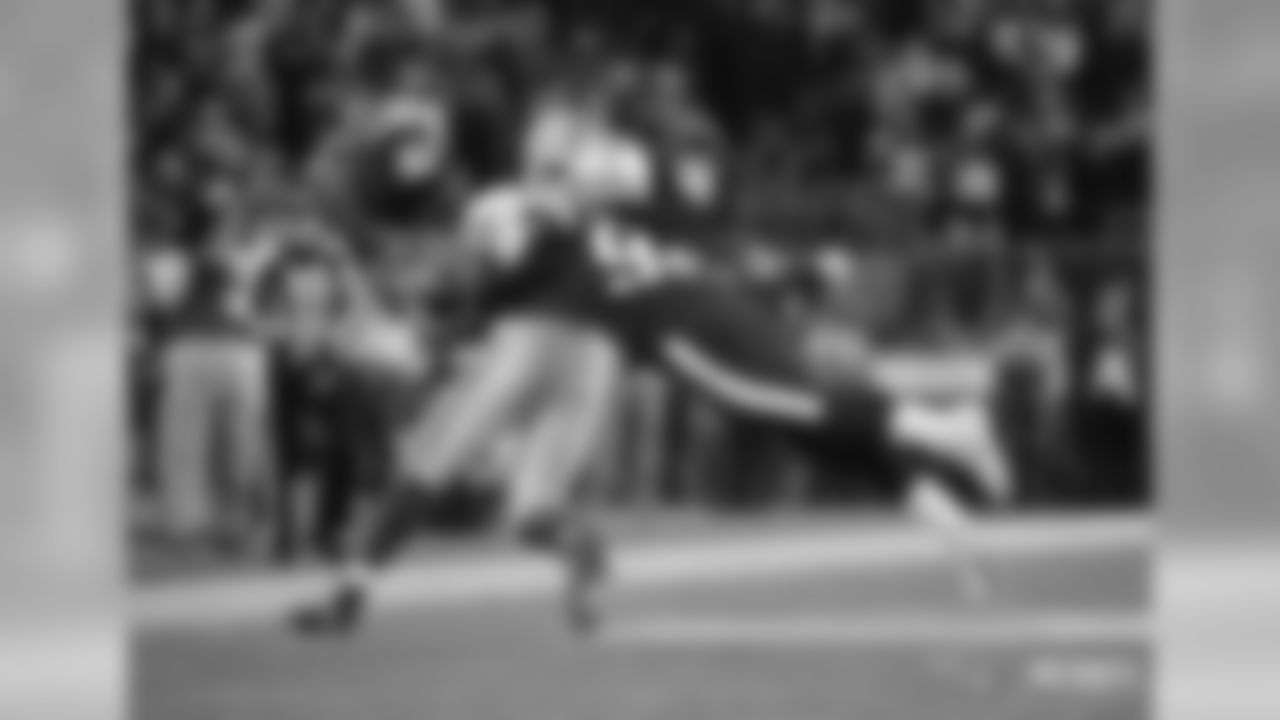 Adrian Clayborn and Aaron Rodgers
