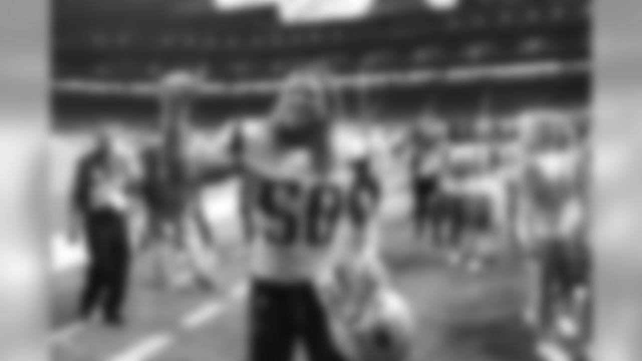 New England Patriots defensive lineman Chase Winovich waves to the crowd after the team's NFL preseason football game against the Detroit Lions, Thursday, Aug. 8, 2019, in Detroit. (AP Photo/Paul Sancya)