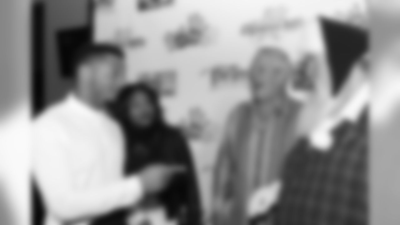 Chung jokes around with Santa Claus and comedian Lenny Clarke.