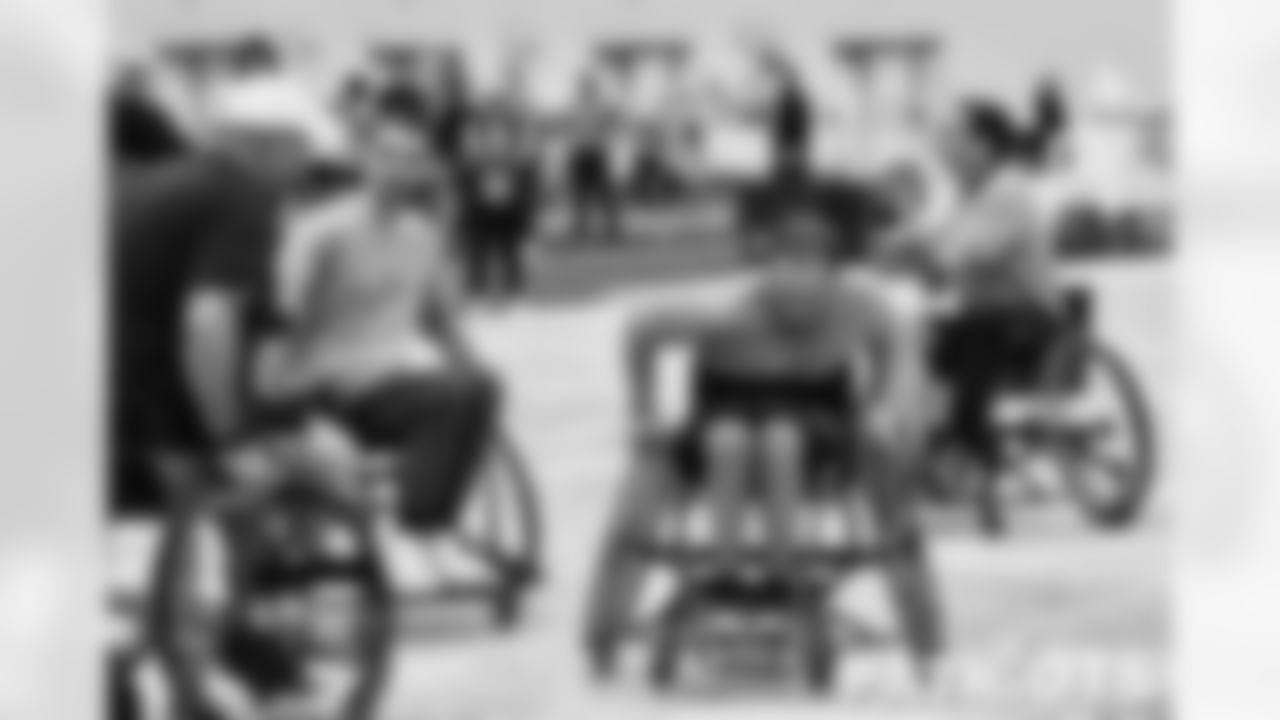 111322-WheelchairFootball_Randi_Woodrow53-watermarked