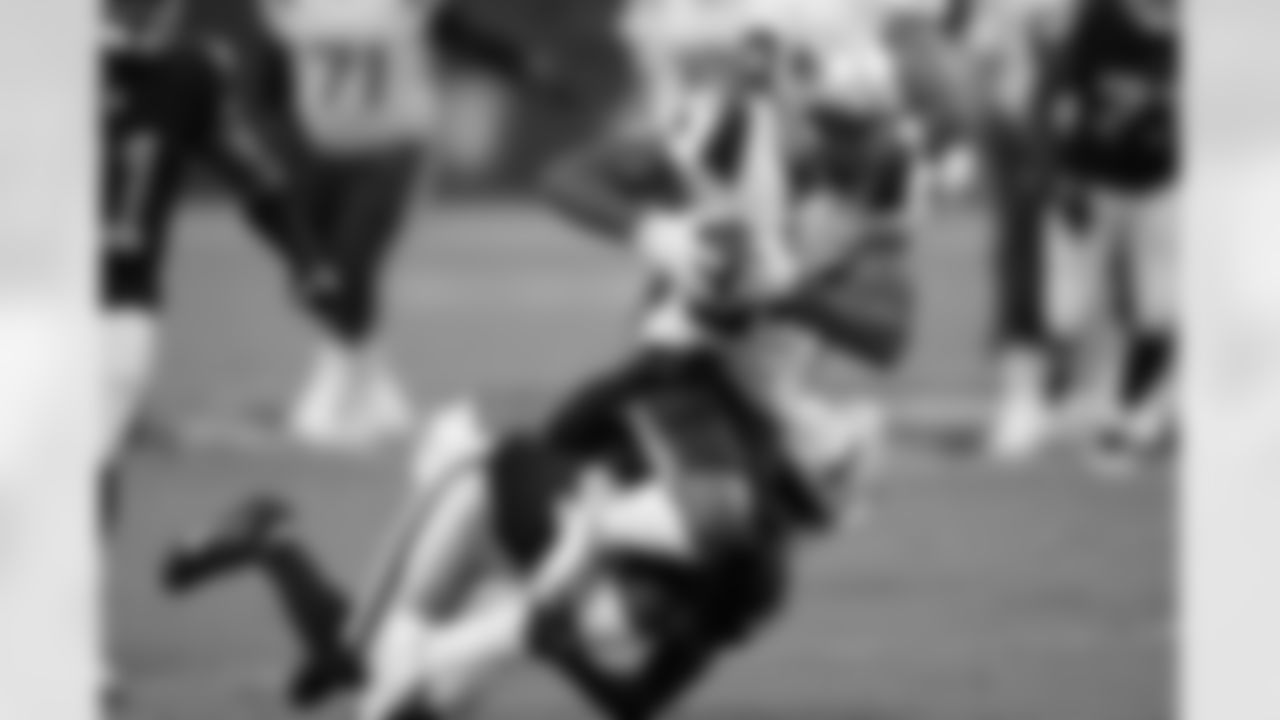 New England Patriots wide receiver Kendrick Bourne (84) is tackled by Las Vegas Raiders cornerback Isiah Brown (46)