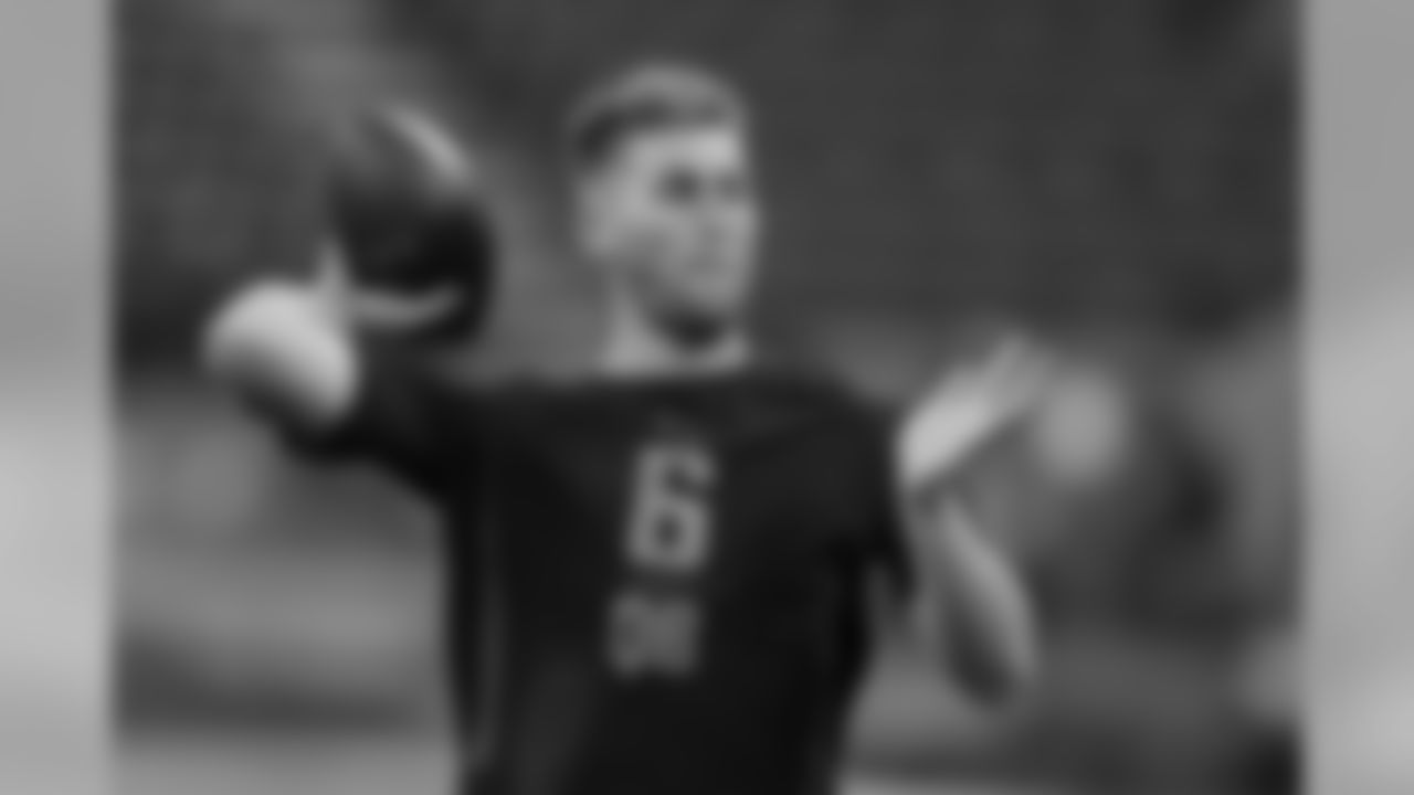 LSU quarterback Danny Etling runs a drill at the NFL football scouting combine in Indianapolis, Saturday, March 3, 2018. (AP Photo/Michael Conroy)