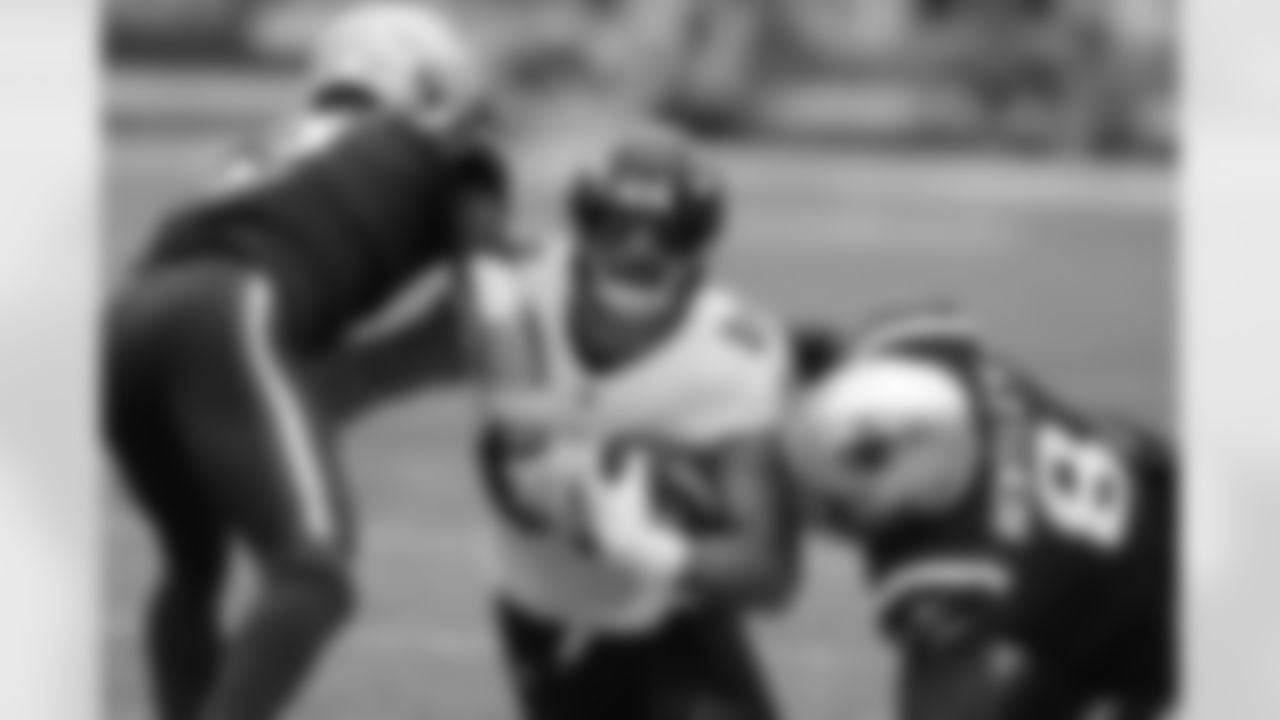 Ja'Whaun Bentley and Jalen Mills tackling Mark Andrews
