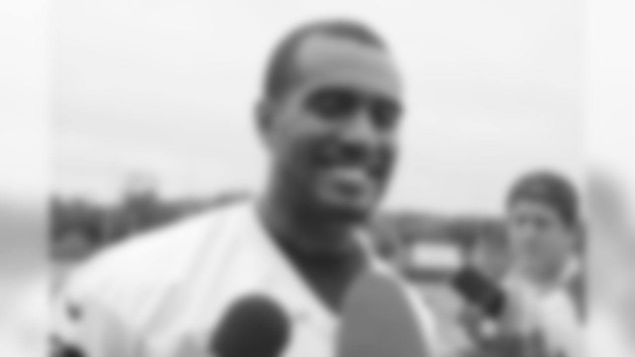 Aaron Dobson talks with the media
