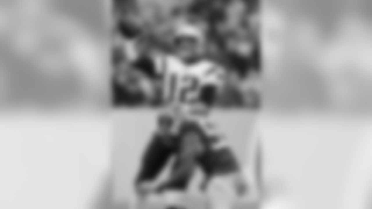 Tom Brady and Wesley Woodyard