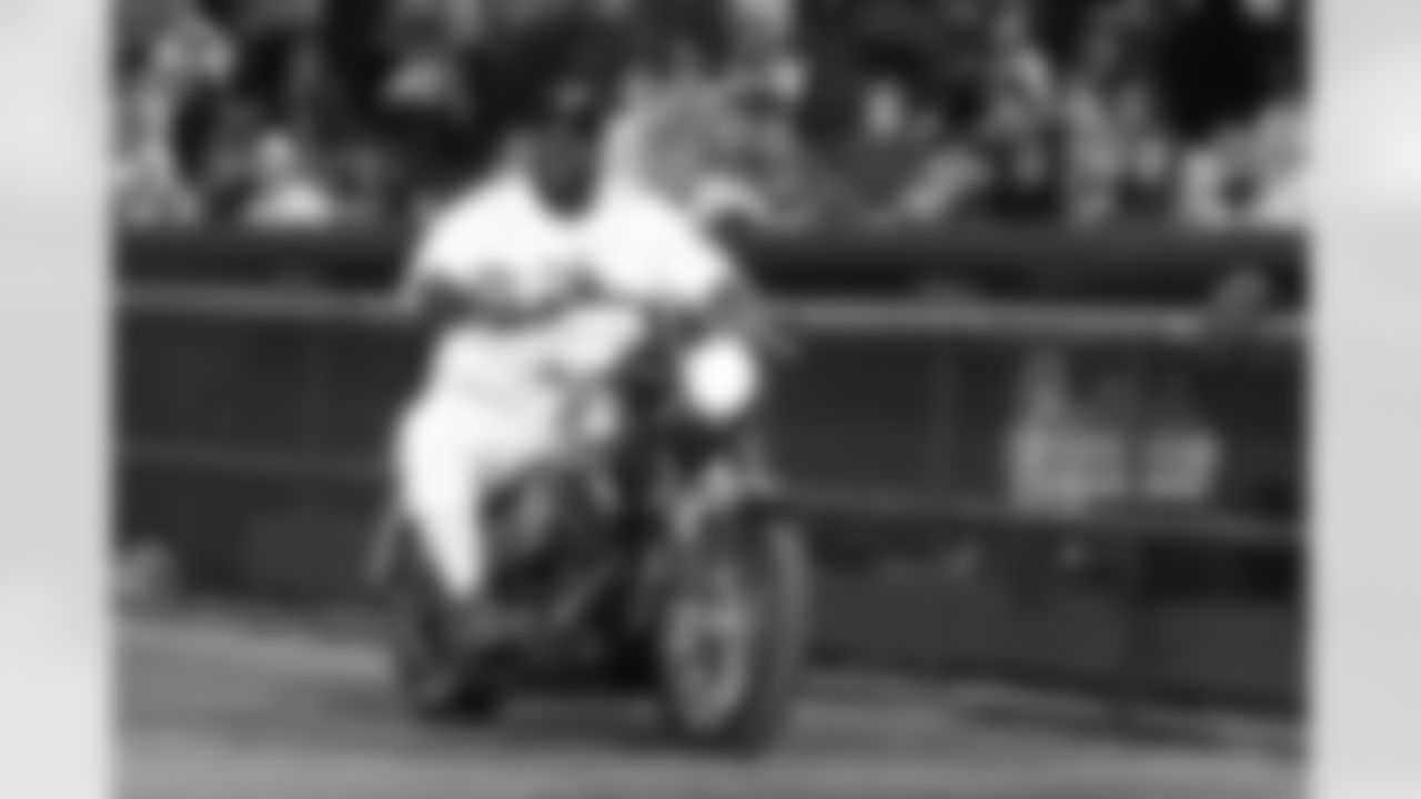 305 NFL v SWAT Softball -- Vince on bike -- by Lisa Kenney
