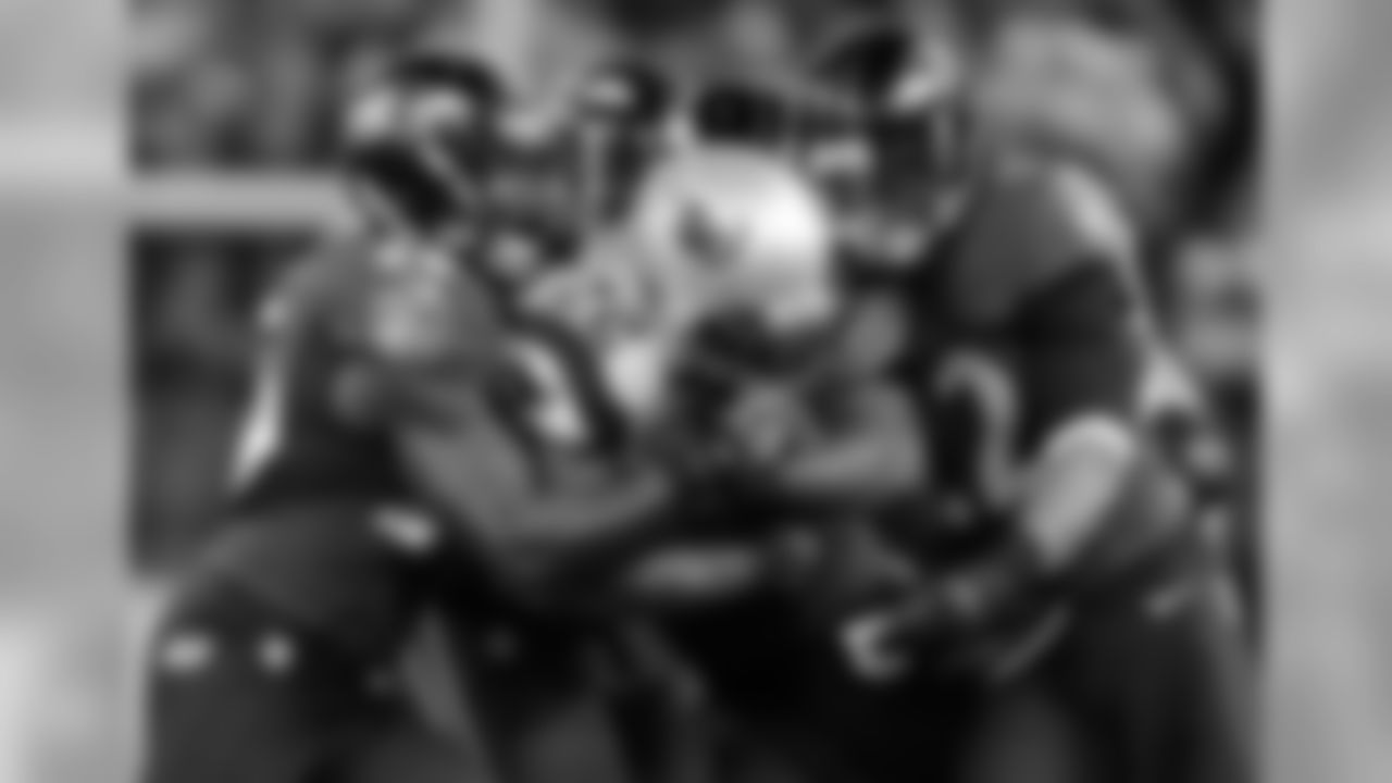 A host of Ravens defenders attempt to take down Stevan Ridley