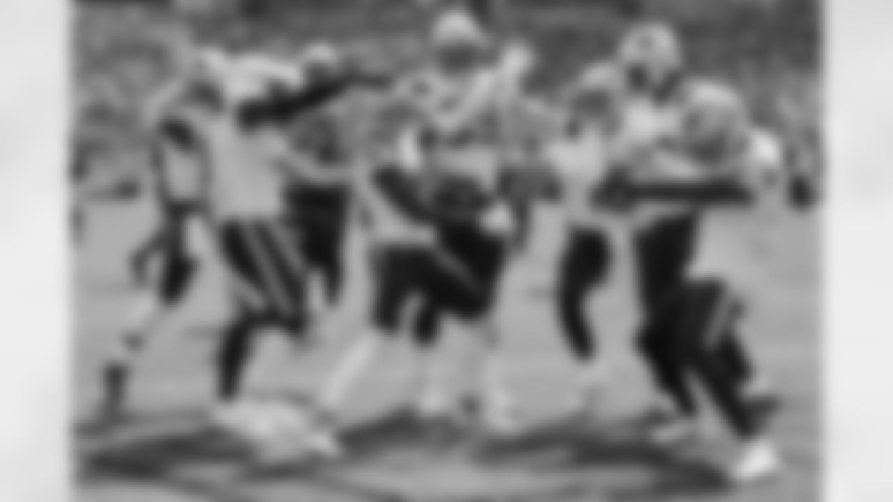 New England Patriots wide receiver Nelson Agholor, center, celebrates