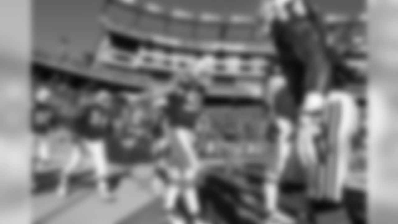 New England Patriots players take the field for warm-ups prior to an NFL football game against the New York Jets in Foxborough, Mass., Sunday, Oct. 9, 2011. (AP Photo/Elise Amendola)
