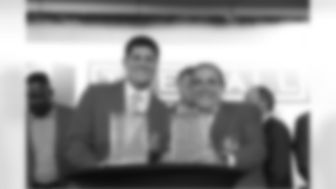 Tedy Bruschi and Gil Santos