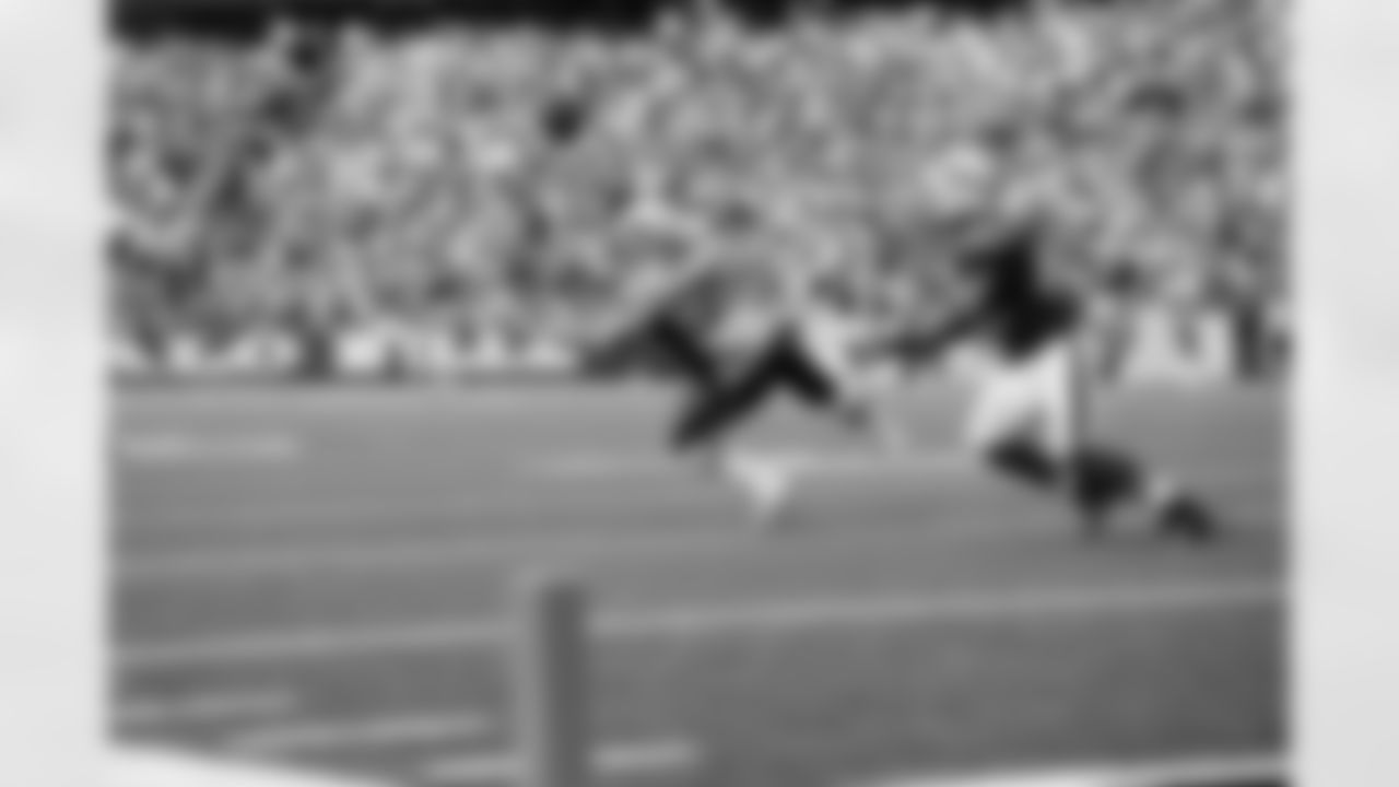 Danny Woodhead tips a Tom Brady pass that turns into one of his four interceptions on the day.