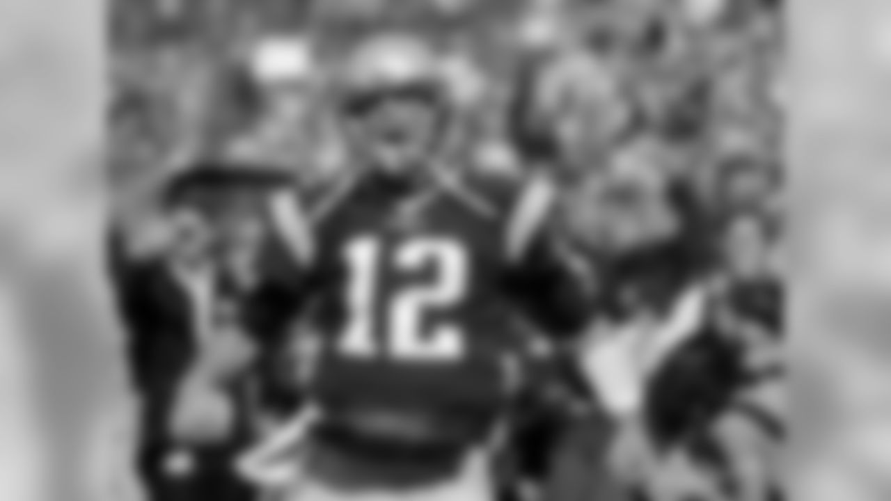 New England Patriots quarterback Tom Brady gets fired up as he takes the field for warm-ups before an NFL football game against the Cincinnati Bengals, Sunday, Oct. 16, 2016, in Foxborough, Mass. (AP Photo/Elise Amendola)