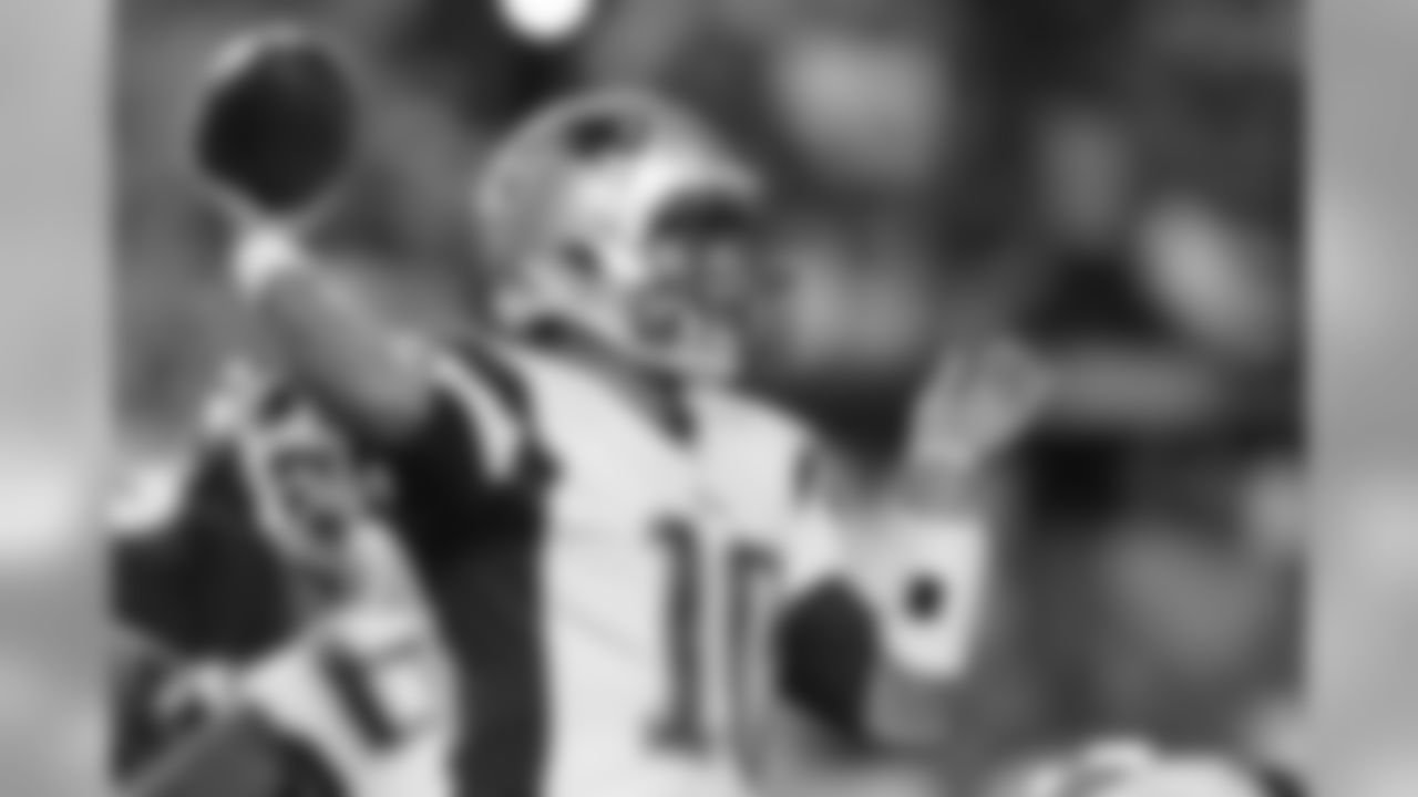 New England Patriots quarterback Jimmy Garoppolo passes the ball during the second half of an NFL football preseason game against the Washington Redskins in Landover, Md., Thursday, Aug. 7, 2014. (AP Photo/Connor Radnovich)