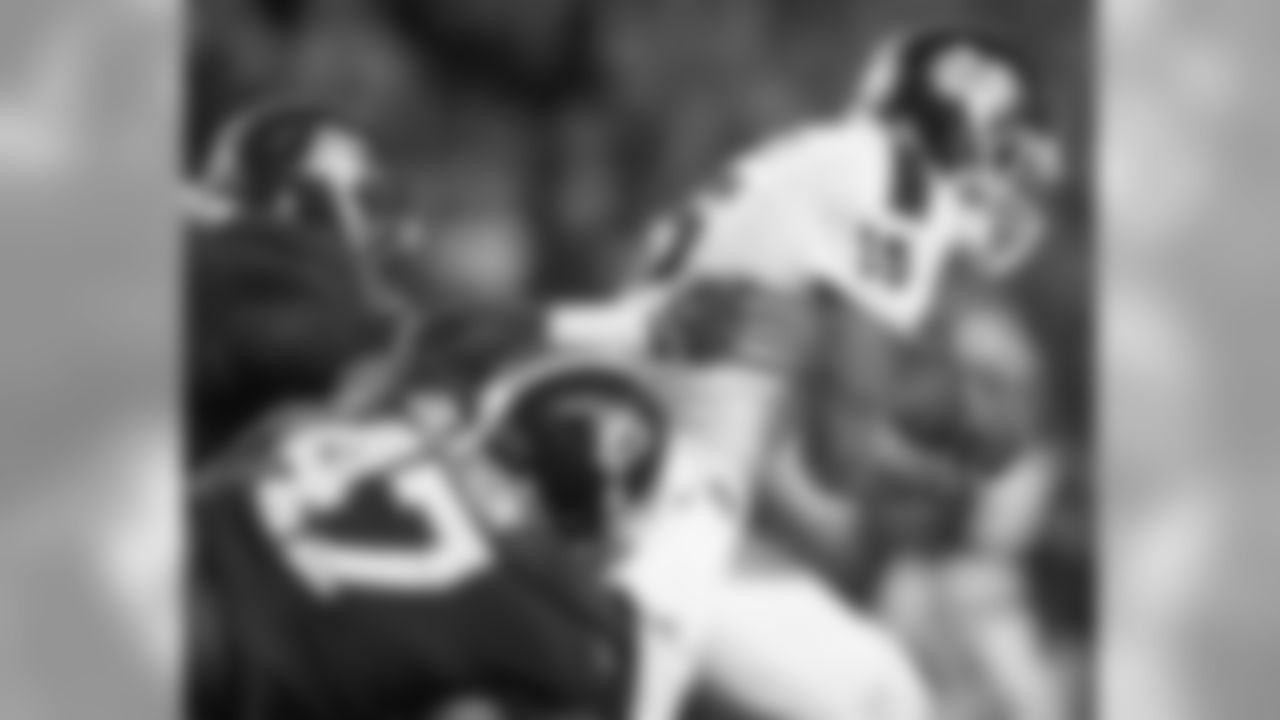 Mississippi State quarterback Dak Prescott (15) is taken down by Alabama linebacker Xzavier Dickson (47) and Alabama defensive lineman A'Shawn Robinson (86) during the second half of an NCAA college football game Saturday, Nov. 15, 2014, in Tuscaloosa, Ala. Alabama won 25-20. (AP Photo/Brynn Anderson)