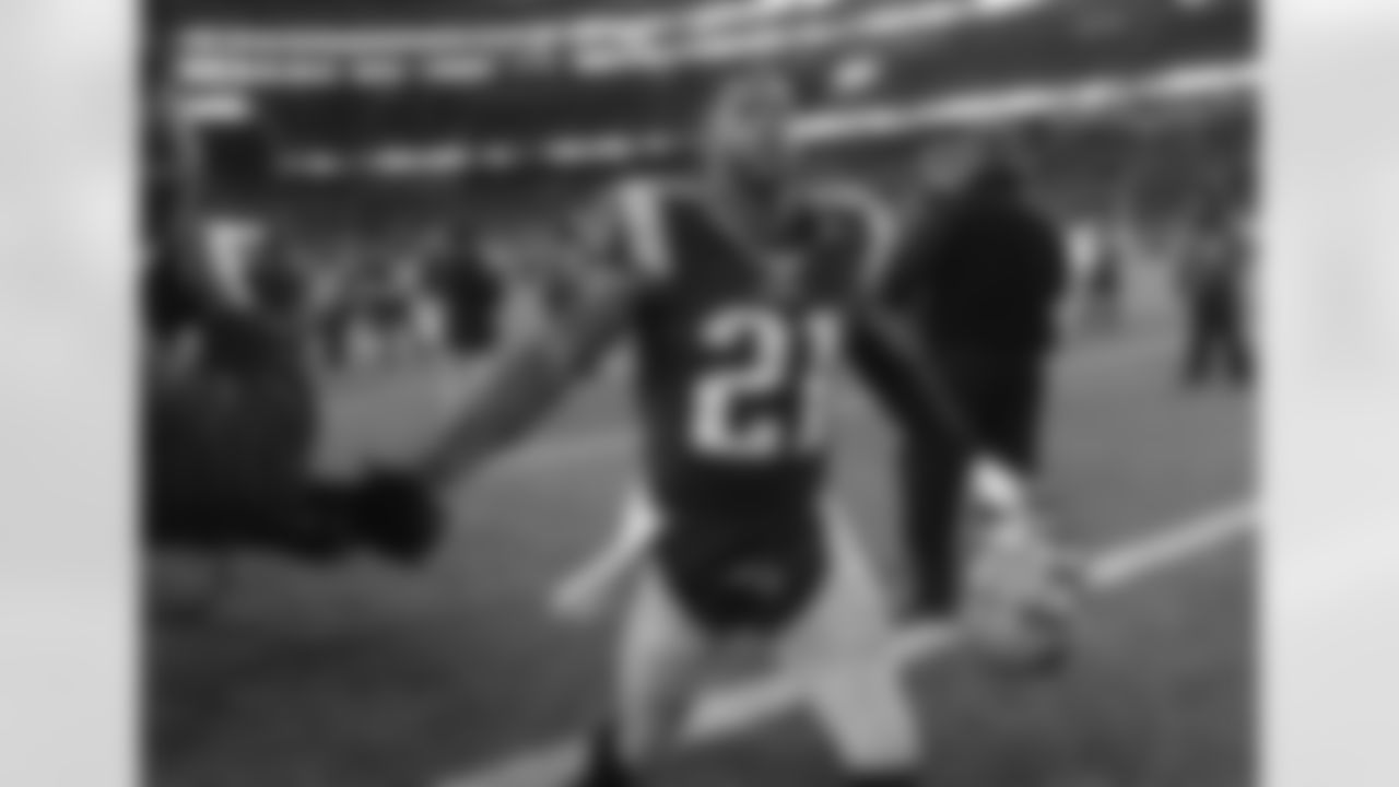 New England Patriots cornerback Malcolm Butler (21) leaves the field after an NFL divisional playoff football game against the Houston Texans, Saturday, Jan. 14, 2017, in Foxborough, Mass. (AP Photo/Elise Amendola)