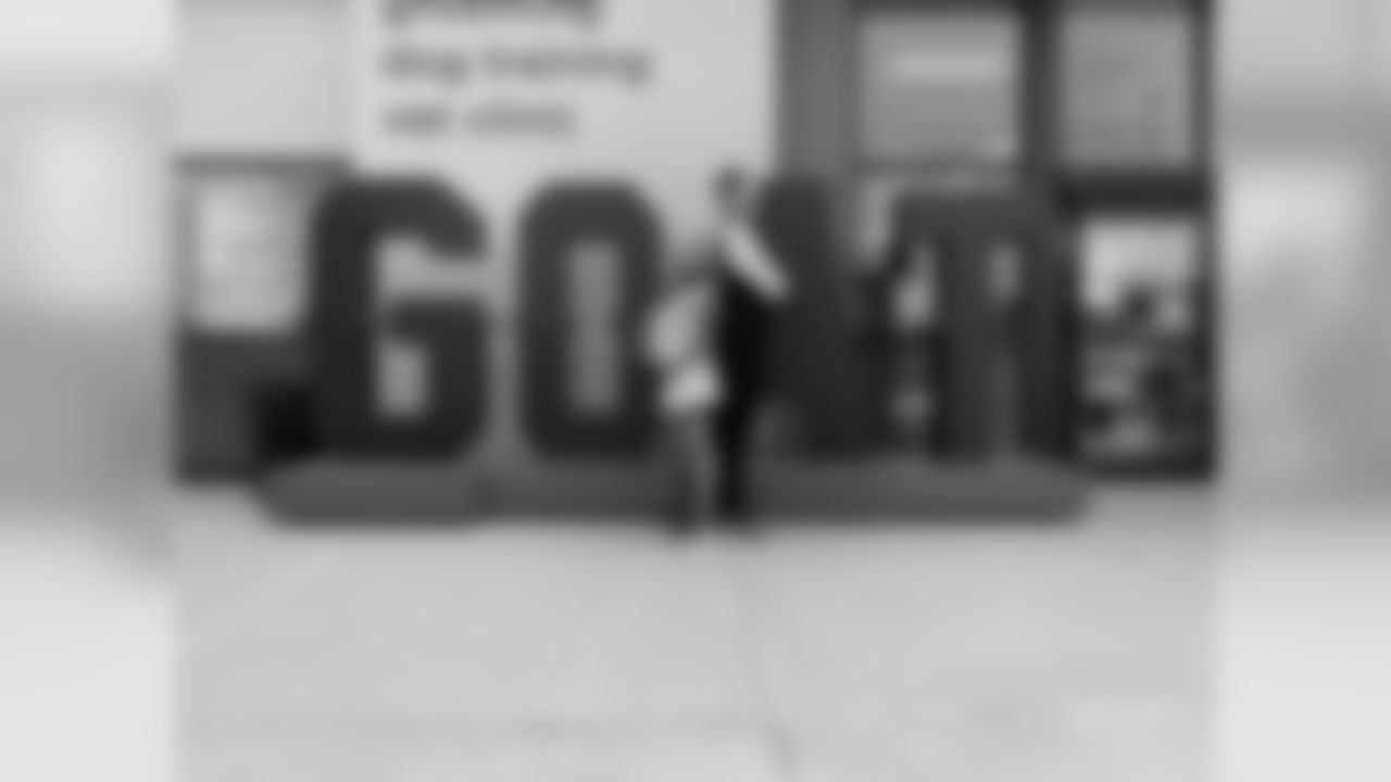 Courtney K & Driss attend Patriot Place's Petco DockDog event.