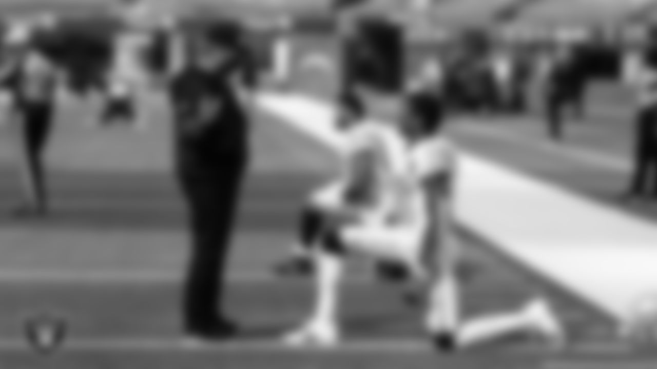 Las Vegas Raiders Head Coach Jon Gruden and wide receiver Zay Jones (12) before the regular season away game against the Los Angeles Chargers.