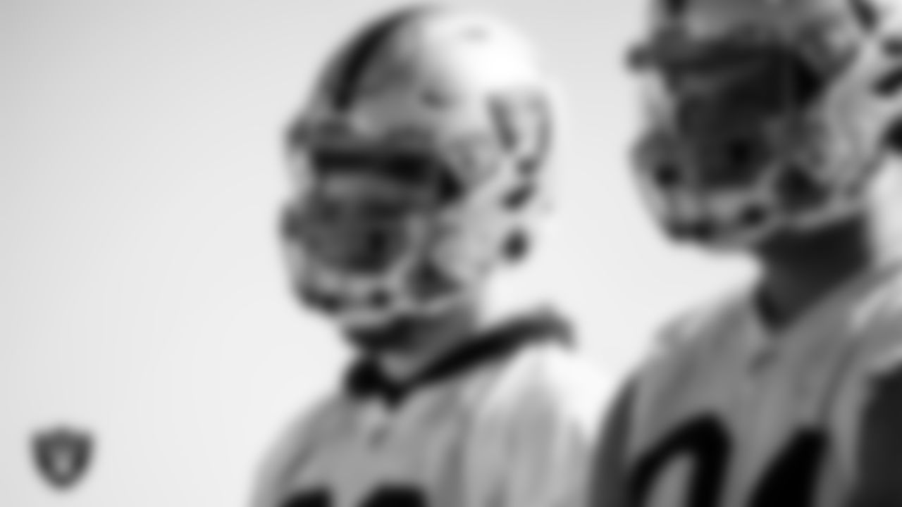 Las Vegas Raiders defensive end Maxx Crosby (98) and defensive end Carl Nassib (94) during practice.