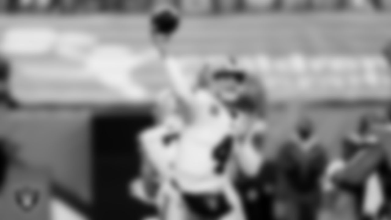 Las Vegas Raiders quarterback Derek Carr (4) during the regular season game against the Denver Broncos at Empower Field at Mile High.