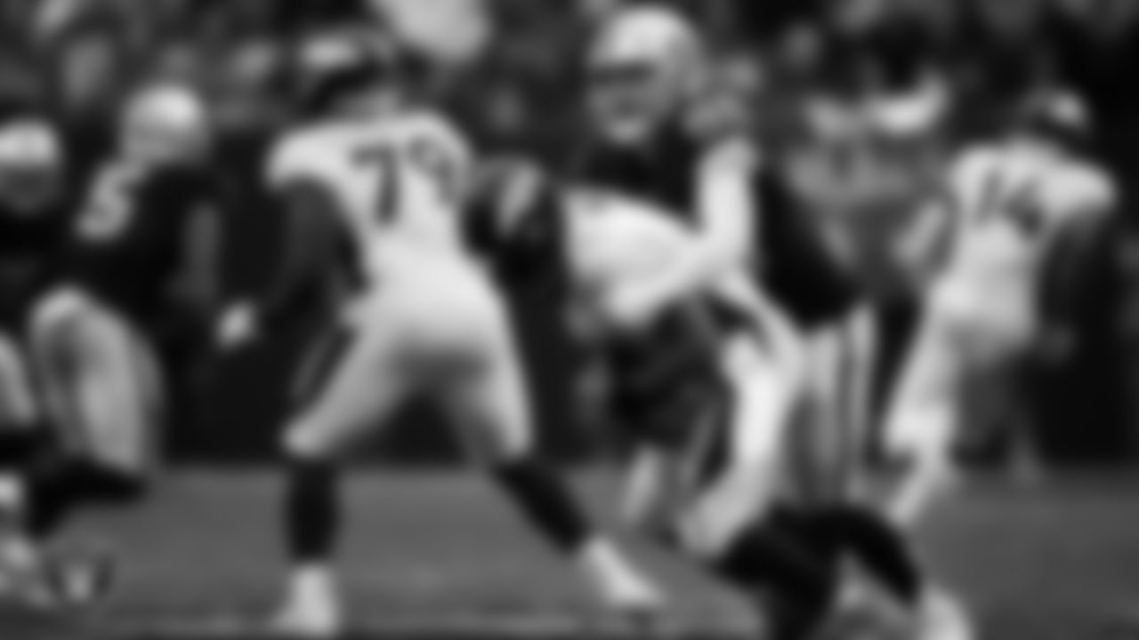 Las Vegas Raiders defensive end Maxx Crosby (98) sacks the quarterback during the regular season home game against the Denver Broncos at Allegiant Stadium.