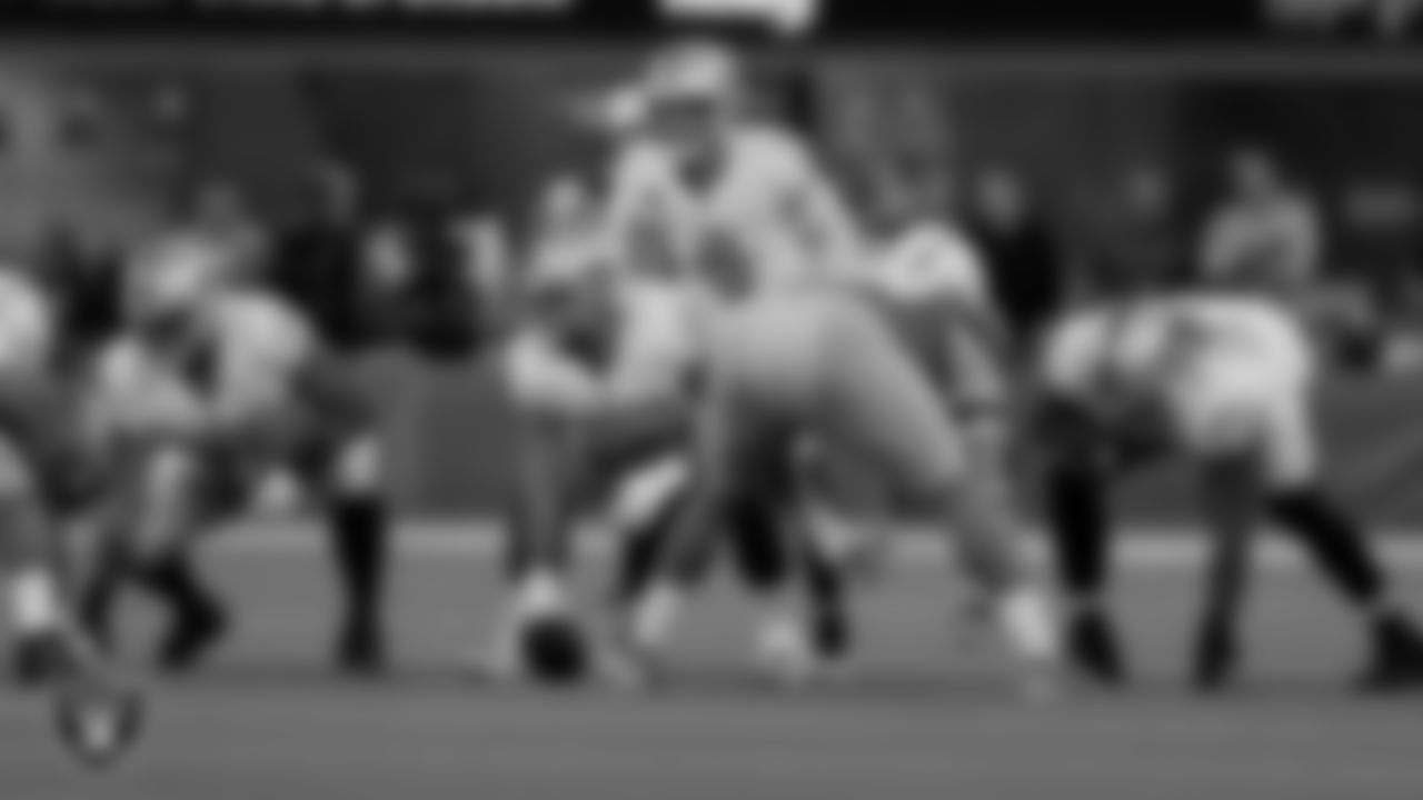 Las Vegas Raiders offensive lineman Jermaine Eluemunor (72), center Andre James (68), quarterback Derek Carr (4) and guard John Simpson (76) during the regular season away game against the Los Angeles Chargers.
