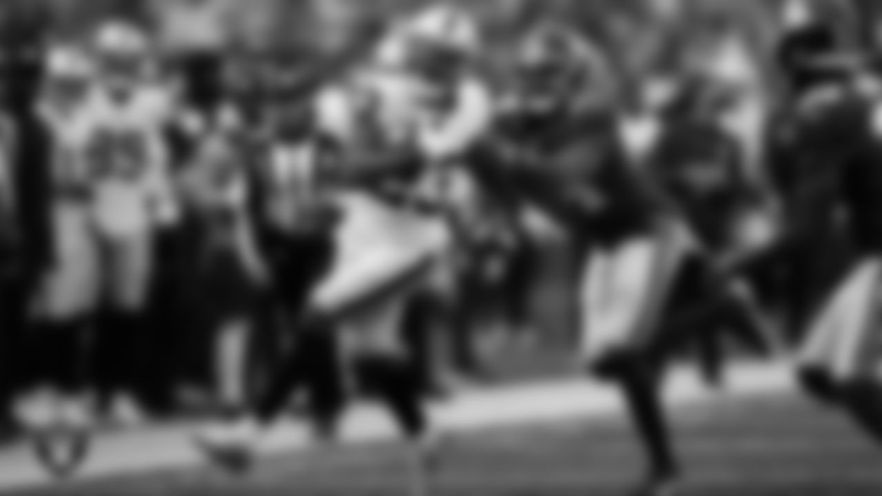 Las Vegas Raiders running back Kenyan Drake (23) runs after making a catch during the regular season away game against the New York Giants.