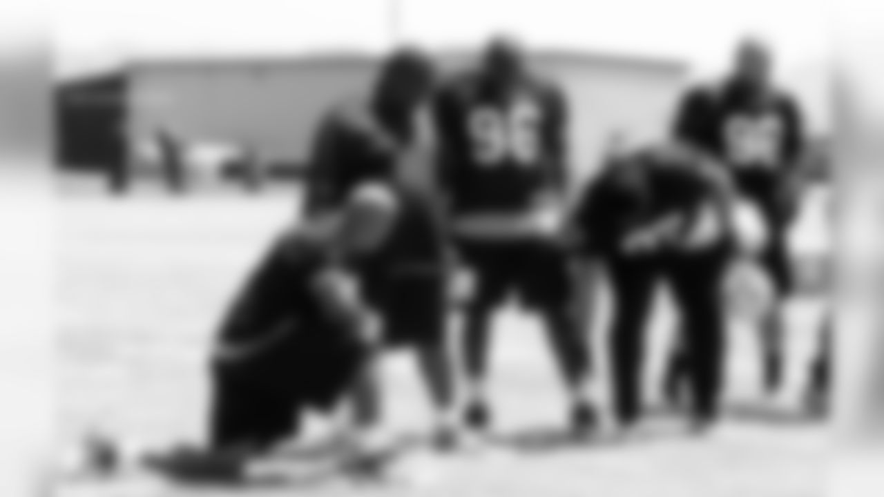 Defensive line coach Terrell Williams with his defensive line.
