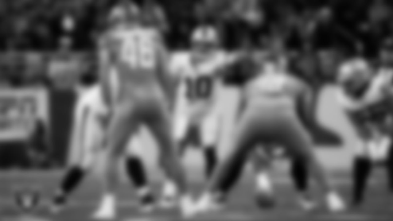 Las Vegas Raiders quarterback Jimmy Garoppolo (10) calls out the defense during the regular season away game against the Detroit Lions at Ford Field.