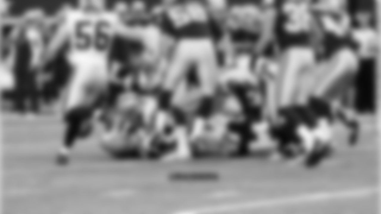 LB Kaelin Burnett forces a Cowboy fumble on the first play of the game.
