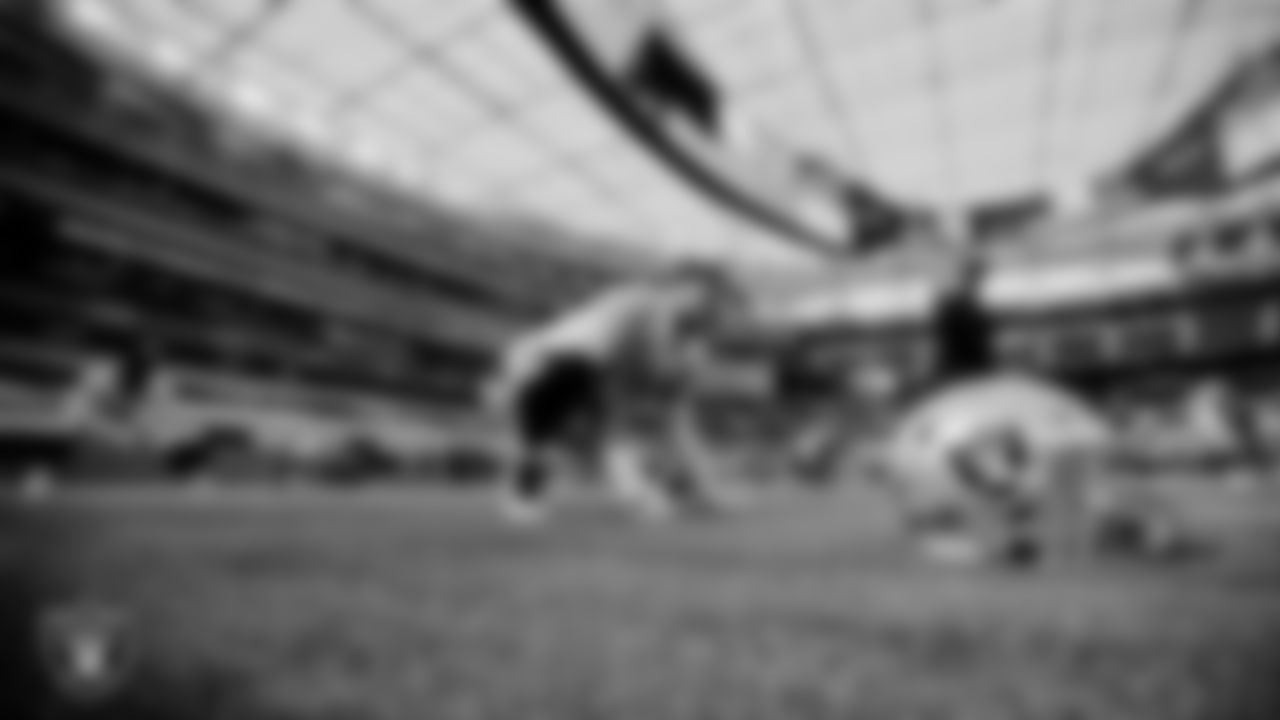 The Raiders warm up before the regular season game against the Los Angeles Chargers at SoFi Stadium.