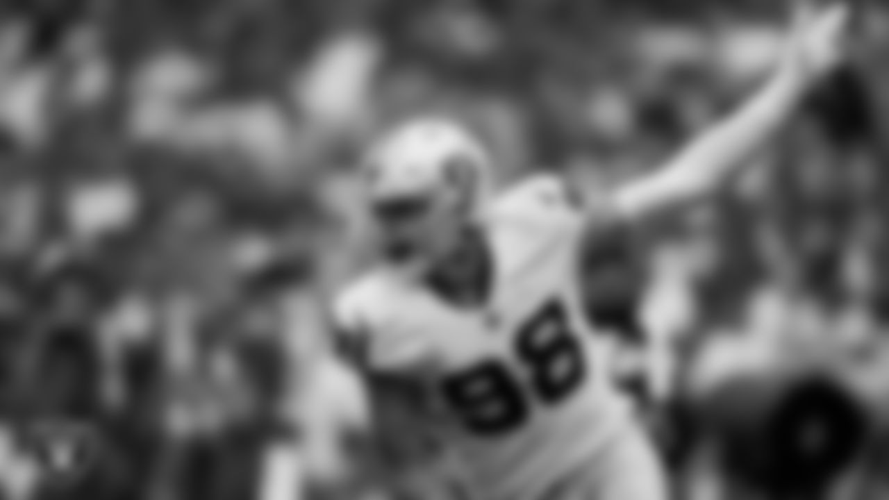 Las Vegas Raiders defensive end Maxx Crosby (98) celebrates after making a tackle during the regular season away game against the Jacksonville Jaguars at TIAA Bank Field.