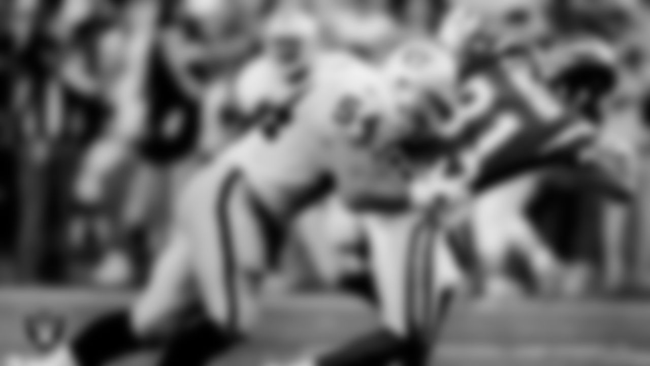 Raiders linebacker Greg Biekert (54) makes a tackle during the regular season away game against the San Diego Chargers at Qualcomm Stadium, Sunday, December 26, 1999.