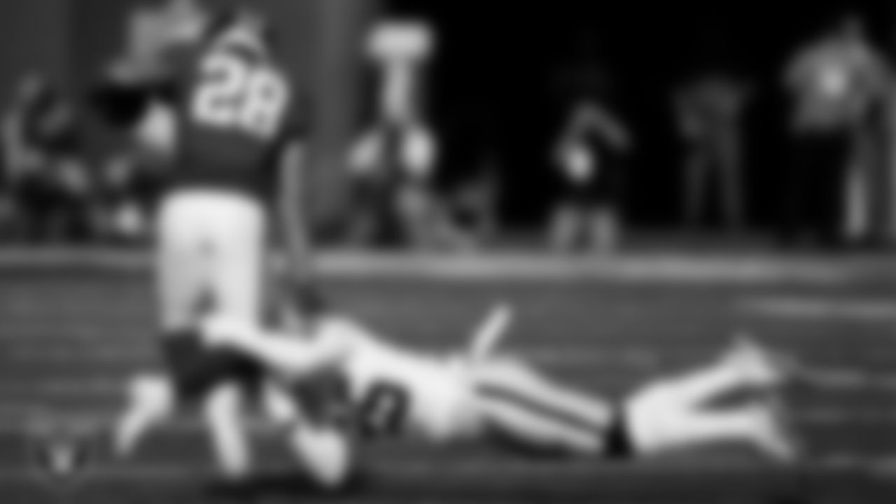 Las Vegas Raiders safety Tre'von Moehrig (25) makes a tackle during the regular season away game against the New York Giants.