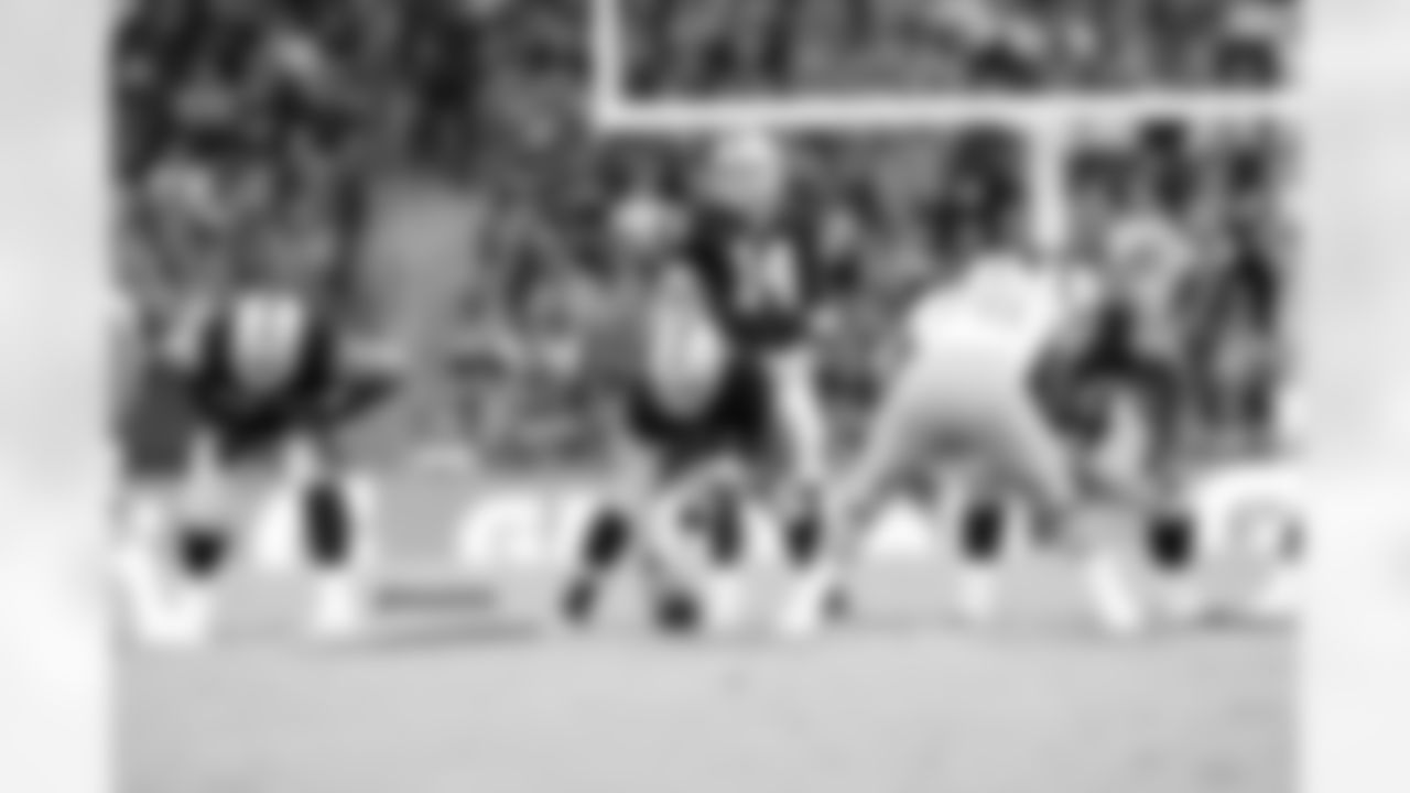 QB Matt McGloin calls out the MIKE linebacker at the line of scrimmage.