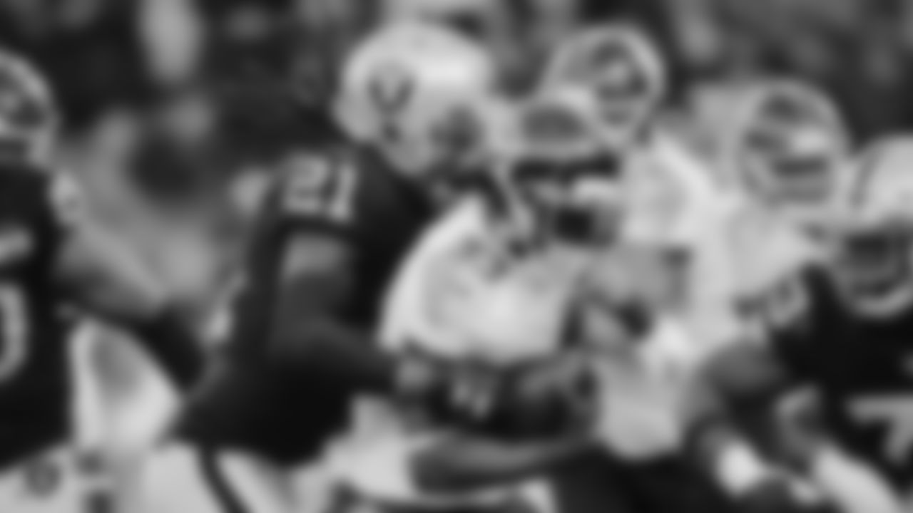 Raiders safety D.J. Swearinger (21) makes a tackle during the regular season game against the Tennessee Titans.