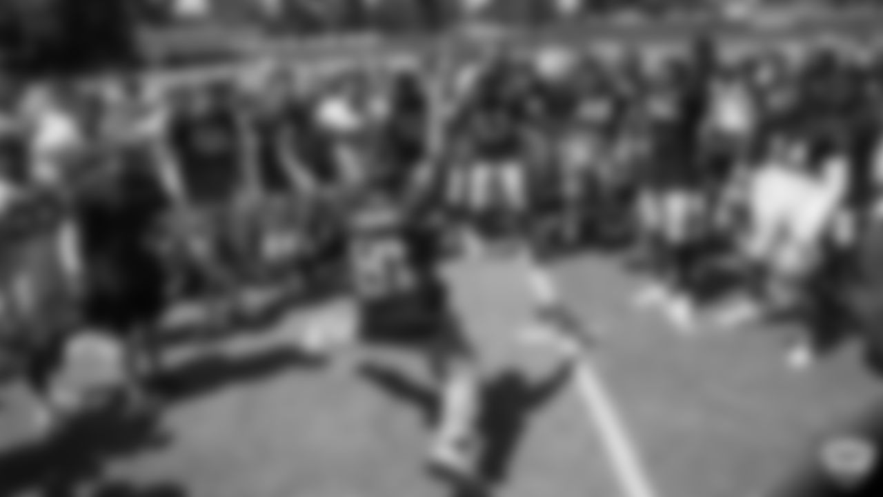 Raiders employee Erick Estrada break dances for the team on the field for practice at 2019 Training Camp.