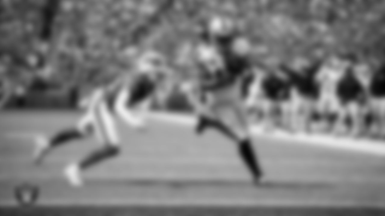 Las Vegas Raiders wide receiver Davante Adams (17) makes a 16-yard touchdown catch during the regular season away game against the Buffalo Bills at Highmark Stadium.
