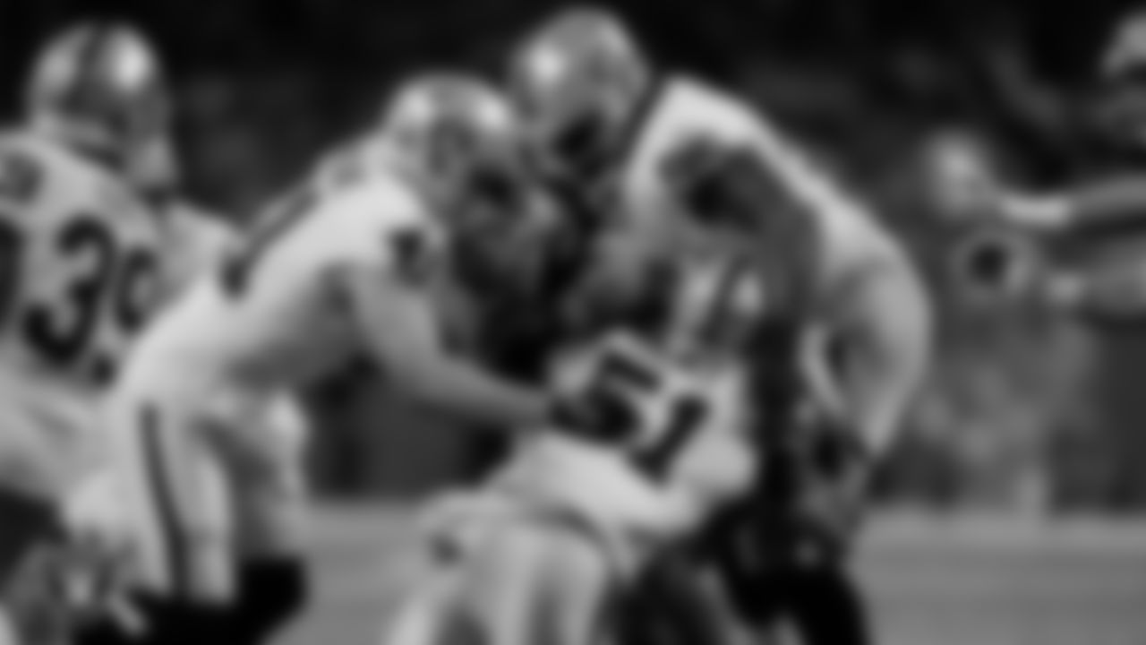 Las Vegas Raiders linebacker Robert Spillane (41), defensive end Malcolm Koonce (51) and defensive tackle John Jenkins (95) during the regular season away game against the Detroit Lions at Ford Field.