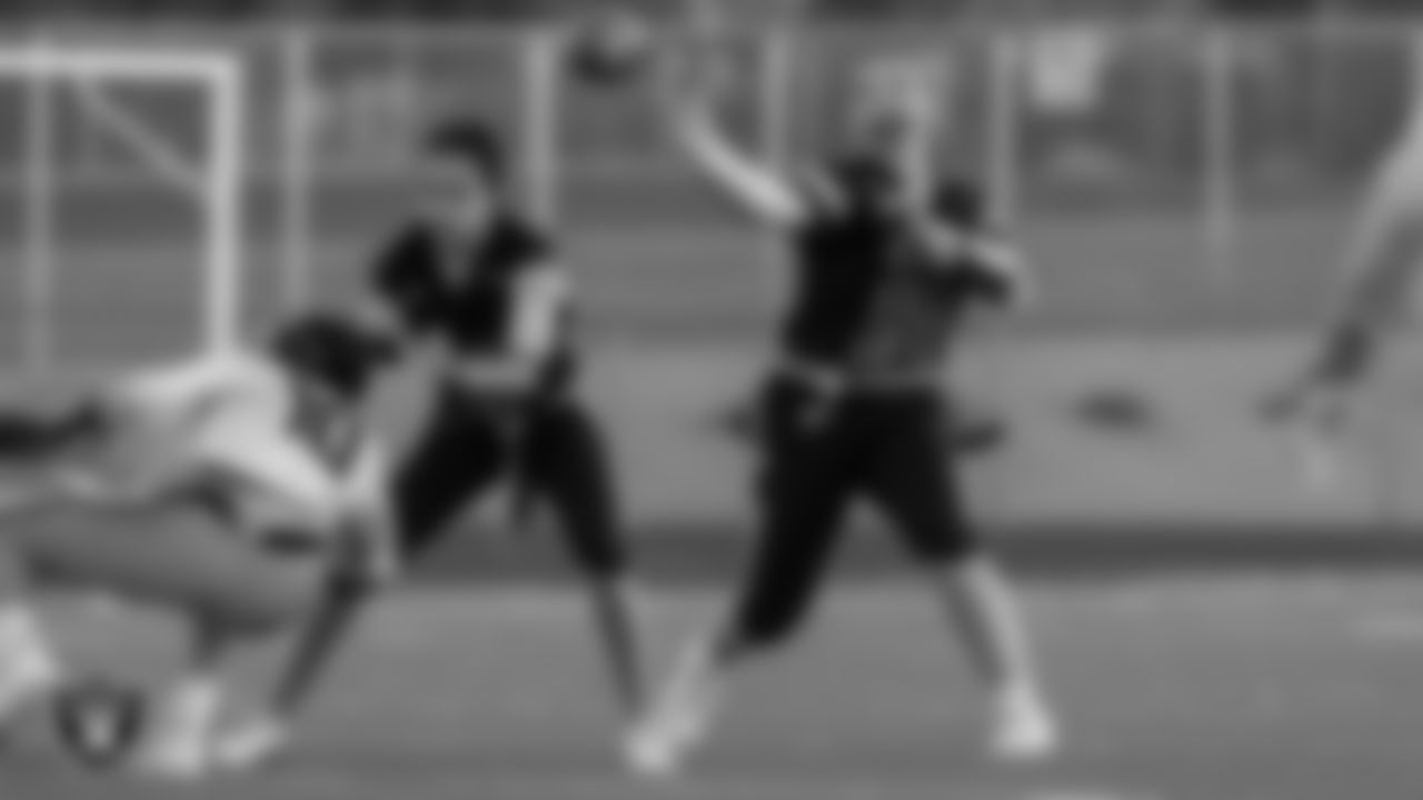 A member of the Basic High School girls flag football team passes during the game.