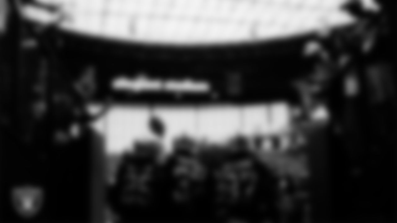 The Las Vegas Raiders defensive backs huddle in the tunnel before the regular season home game against the Chicago Bears.