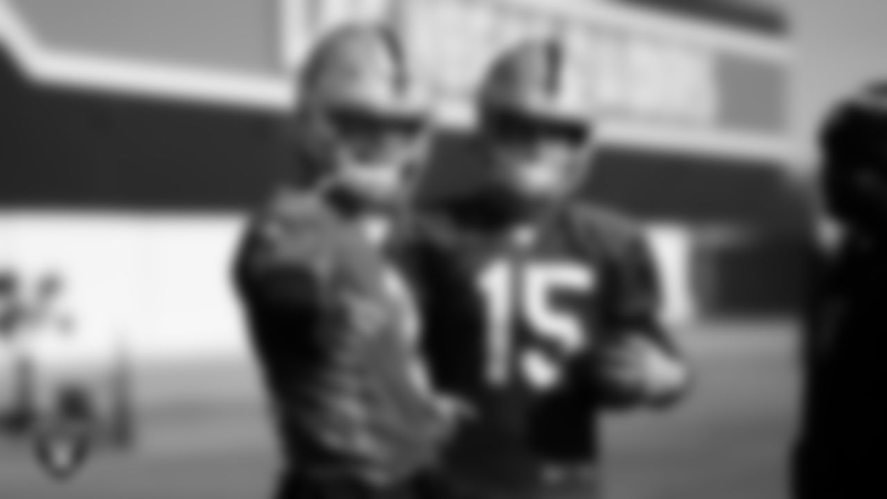 Las Vegas Raiders quarterback Jarrett Stidham (3) and quarterback Chase Garbers (15) during practice at Intermountain Healthcare Performance Center.